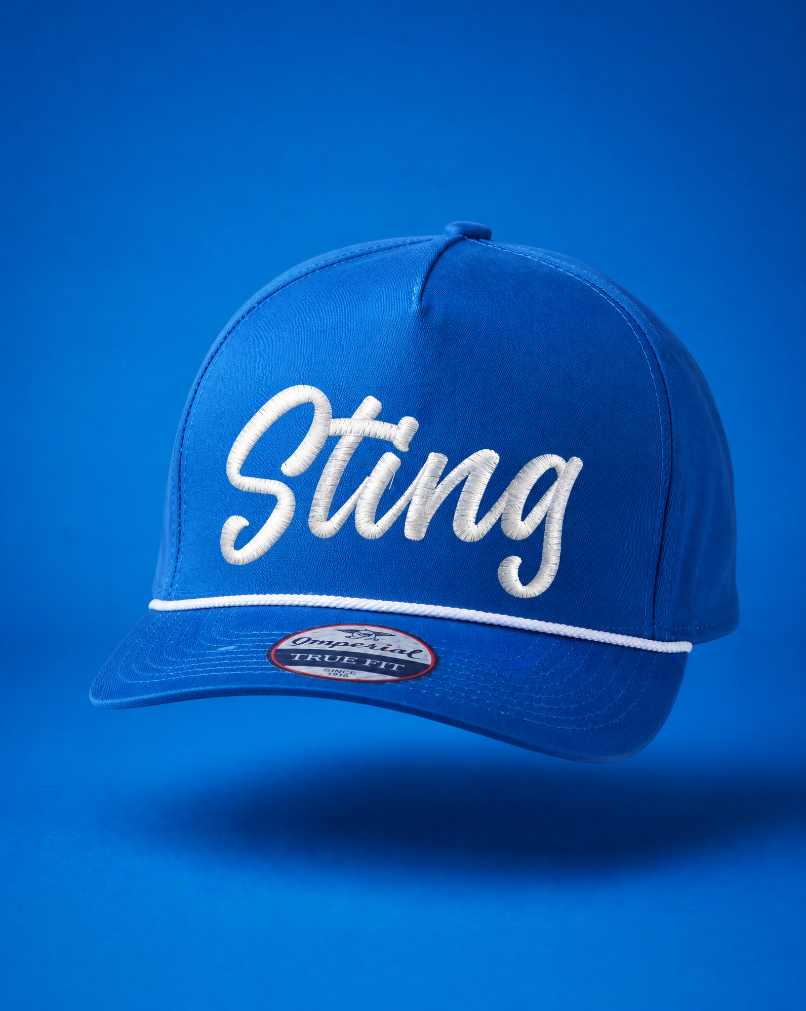 Sting Soccer CORE | Cursive Imperial Cap | Royal/White