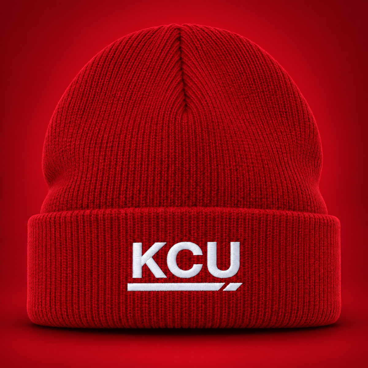 Red rib-knit beanie with a folded cuff and white embroidered KCU monogram.